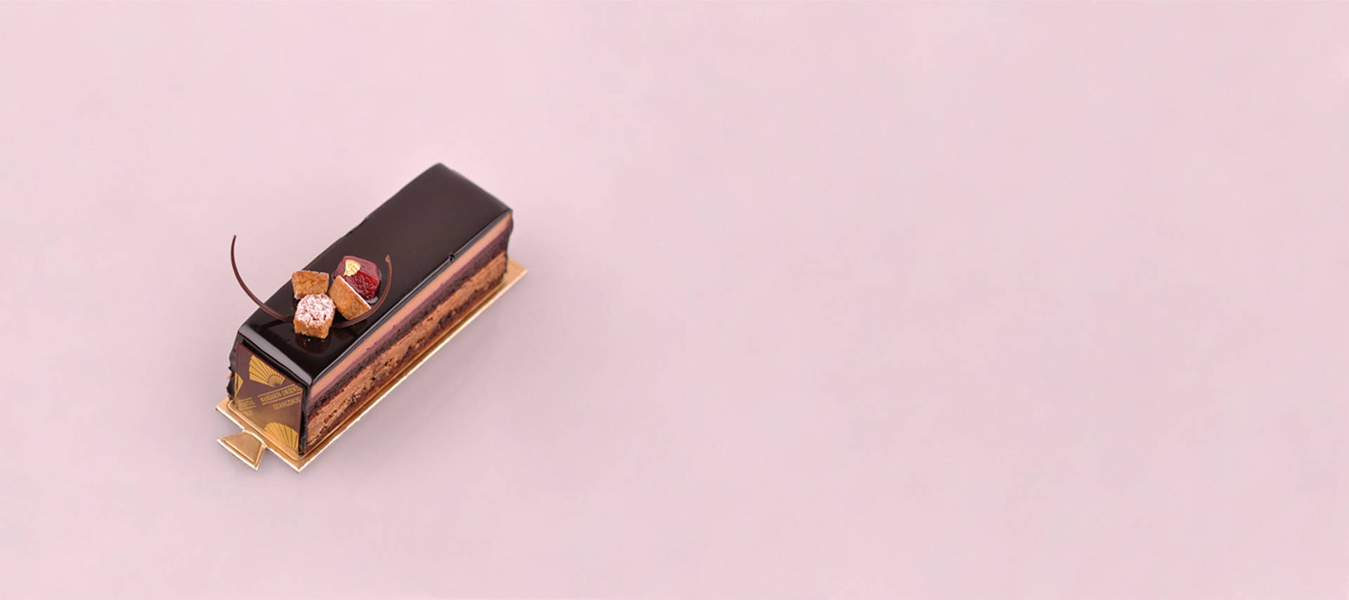 rich chocolate and raspberry confection recipe with earl grey tea, chocolate mousse, raspberry coulis, chocolate sponge cake