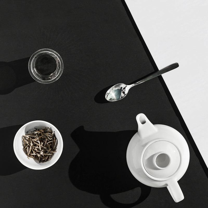 TEALEAVES Fine Bone China White Teapot Beside Teacup